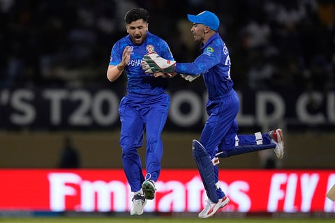 Fazalhaq Farooqi celebrates Finn Allen's wicket 